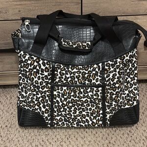 Olympia USA Black and Leopard Print Rolling Travel Bag